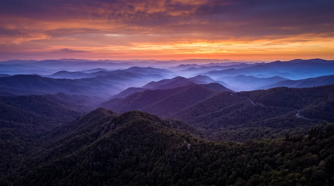 Golden hour sunset aerial vista overlooking East Tennessee horizon.